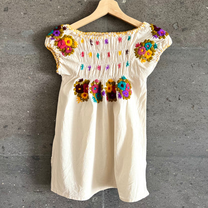 Blusa flores bordadas