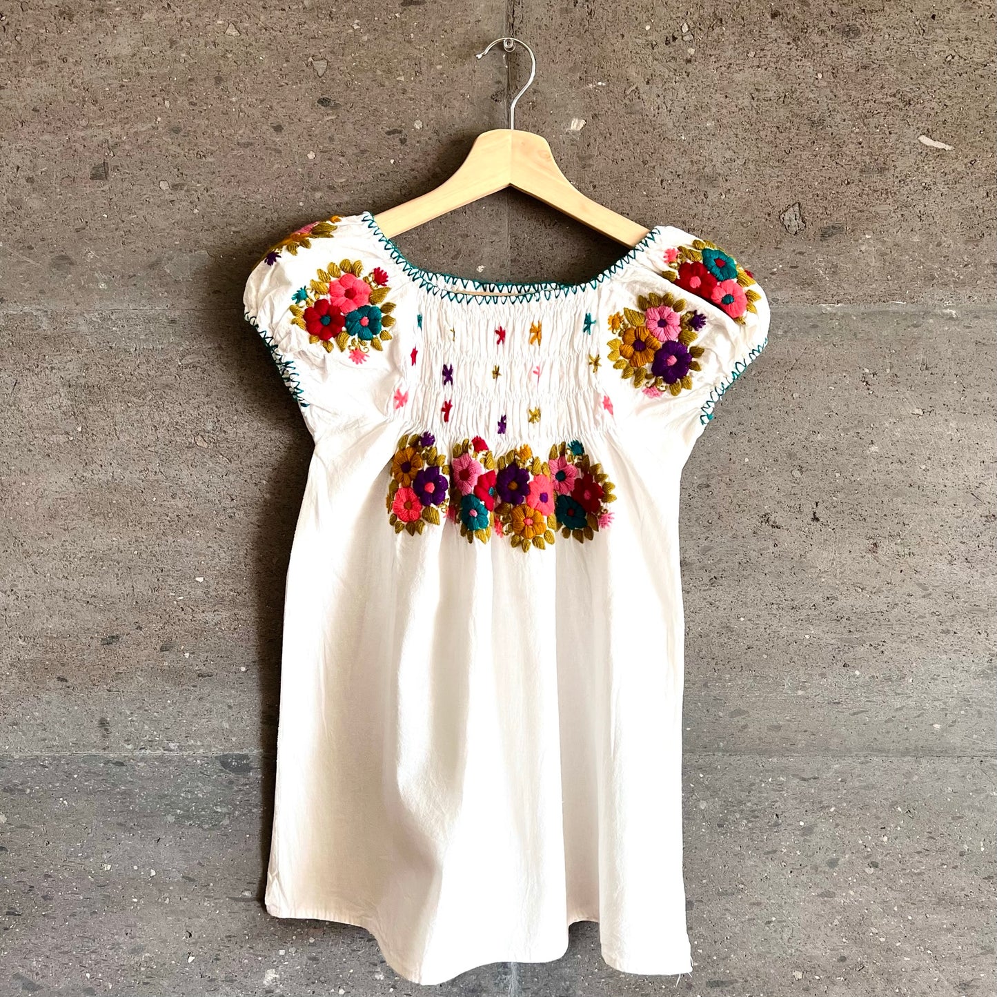 Blusa flores bordadas